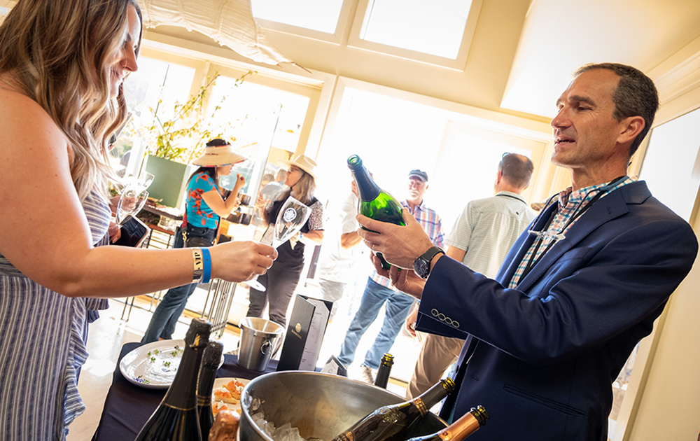 Winemaker Arnaud Weyrich Pouring Champagne