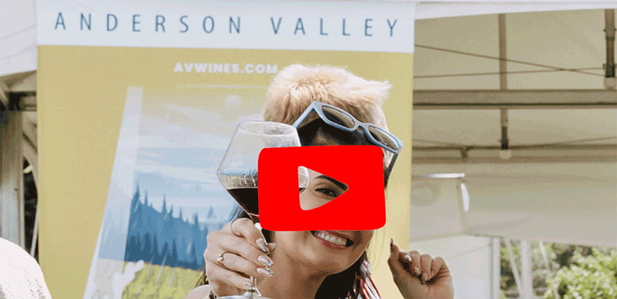 Pinot-Festival-Recap-YouTube Girl holding glass red wine
